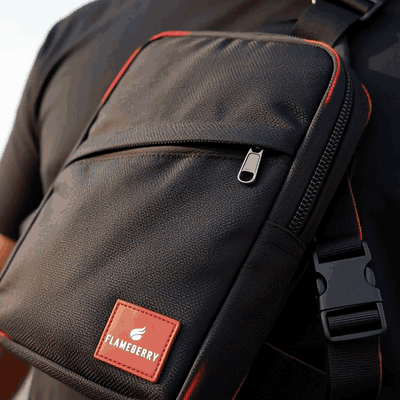 Unzipping the Flameberry sling bag front pocket to grab a phone